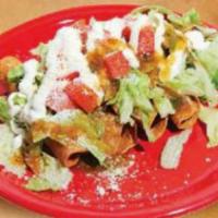 Flautas · 5 rolled chicken taquitos topped with lettuce, pico de gallo, cheese, and sour cream.