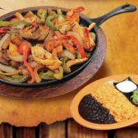 Fajitas · Sautéed onions and peppers with tender slices of your meat of your choice. Served with rice,...
