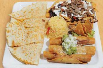 Jalapeno's Platter · Steak nachos, fried rolled taquitos, quesadilla, guacamole, rice, and beans.