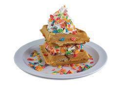 Fruity Pebbles & Cream · Fruity Pebble stuffed waffle and vanilla ice cream topped with whipped cream and Fruity Pebb...