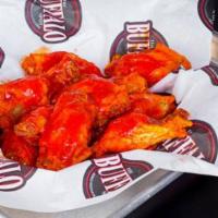 5 Piece Traditional Wings · Comes with 1 sauce and 1 dressing.