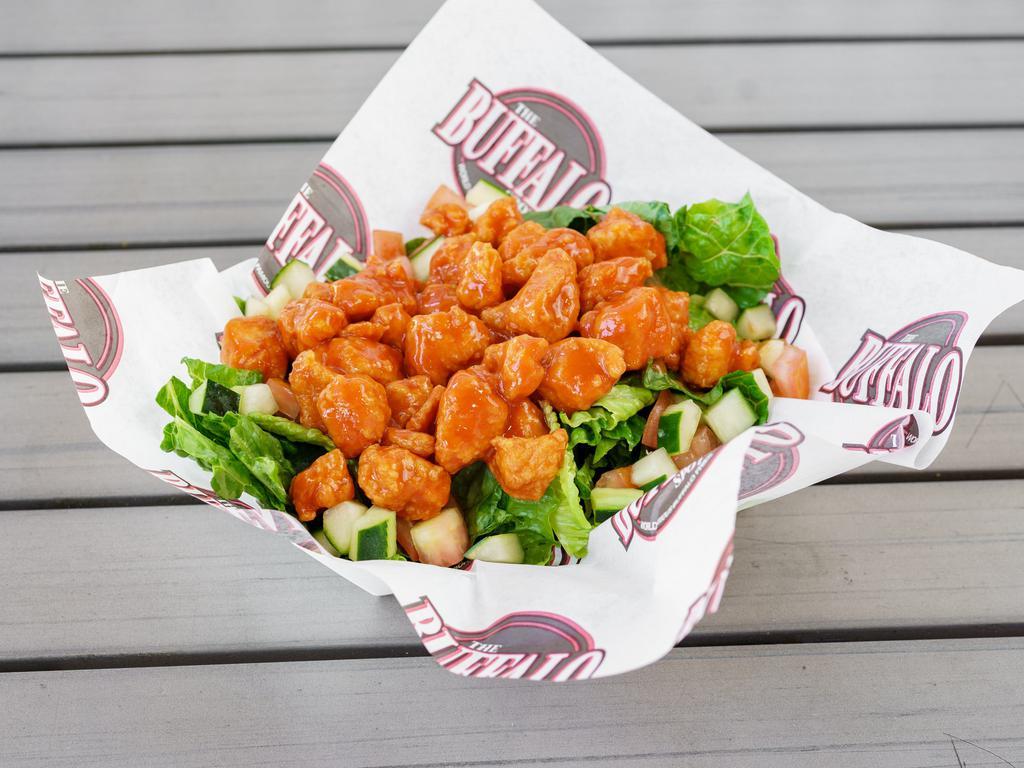 Buffalo Chicken Salad · Fresh romaine lettuce, tomatoes, red onions and cucumbers topped with our delicious diced chicken. Sauce of your choice and dressing of your choice. 