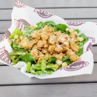 Chicken Caesar Salad · Fresh romaine lettuce with Parmesan cheese and croutons. Topped with delicious chicken tende...