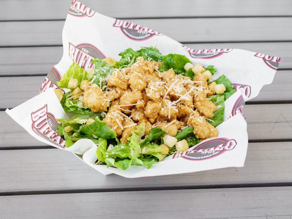 Chicken Caesar Salad · Fresh romaine lettuce with Parmesan cheese and croutons. Topped with delicious diced chicken. Served with Caesar dressing.