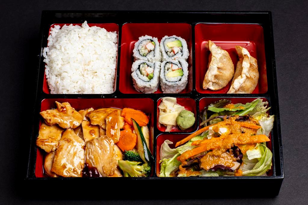 L16 Chicken Teriyaki Lunch Bento Combo · Our grilled house made teriyaki sauce chicken served with rice, salad, gyoza, and house sushi roll comes with Miso Soup