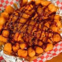 BBQ Pork Loaded Tots · Tots topped with smoked BBQ Pork, BBQ sauce and shredded cheddar