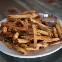 Family Size Fries · Fresh cut russet potatoes, double fried for extra crispiness and served with po'boy sauce.