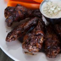 1/2 Order Cherry Wood Smoked Wings · 5 large Wings coated with our own blend of spices, smoked and served with our house-made ram...