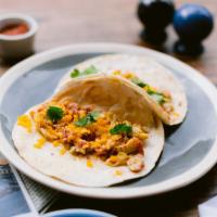2 Breakfast Tacos · Scrambled egg and cheddar with choice of avocado, sausage, bacon or ham.