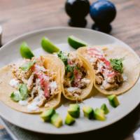 3 Street Tacos · Served with your choice of chicken or pork, radishes, pickled onions, cilantro, Cotija chees...