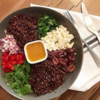 Quinoa Salad · Red quinoa, roasted red peppers, spinach, feta, olives, red onion, cilantro, served with a v...