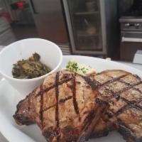 Grilled Pork Chops · Twin center cut chops marinated and grilled to perfection.  Served with mashed potatoes and ...