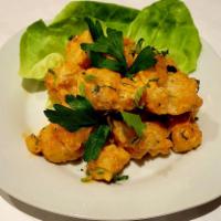 Spicy Rock Shrimps  · Coated in spicy shriracha sauce