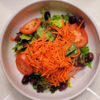 Insalata Mista · Mixed greens, tomatoes, carrots, olives, fine herbs, red wine vinegar and extra virgin olive...