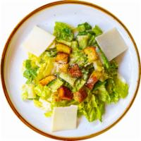 Insalata Romana · Romaine lettuce, Caesar dressing, shaved Parmesan and croutons.