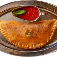 Calzone · Ricotta and mozzarella cheese. Served with side of marinara sauce.
