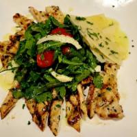 Grilled Chicken Paillard · Over arugula salad and lemon vinaigrette dressing 