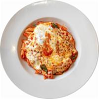 Penne al Filetto di Pomodoro e Formaggio · Fresh plum tomato sauce with spinach, mozzarella cheese and garlic.