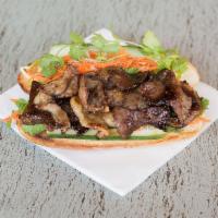 22. Grilled Pork Vietnamese Sandwich · grilled porks, cilantro, jalapeño, chicken mixed porks pates, mayonnaise, pickle ( carrot an...
