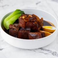 Adobo  · Braised and simmered in soy-vinegar sauce, garlic and spices. Choose from chicken, pork or a...