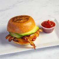 California Burger · Avocado, bacon, cheddar and ketchup. Served on a toasted brioche bun.
