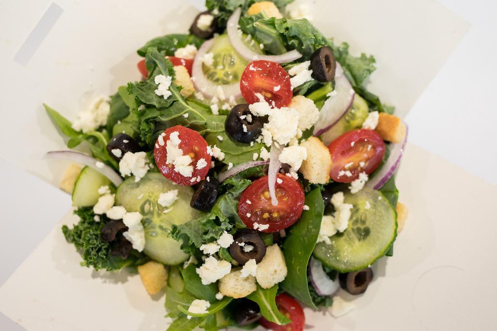 Athena Salad · Greens, feta cheese, tomatoes, cucumbers, Kalamata olives and red onions.