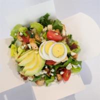 Cobb Salad · Greens, grilled chicken, bacon, avocado, blue cheese, boiled egg, chives and tomatoes.
