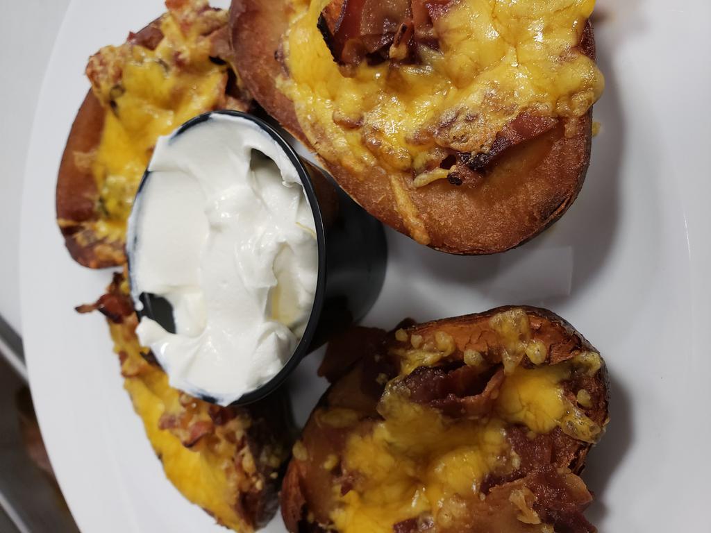 Potato Skins · Topped with bacon and cheddar