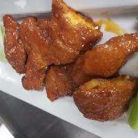Boneless Wings (breaded) · Comes with choice of sauce.