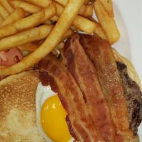 Break Burger Deluxe · Sunny-side up, egg, Hollandaise sauce, and bacon. Served on a brioche bun with coleslaw and ...