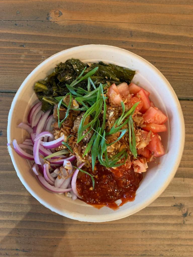 Bicol Express Bowl · Grilled chicken or crispy pork belly with tomatoes, Bokchoy, raw onions, crispy garlic, crispy shallots, fresh scallions, sambal (spicy) and coconut shrimp paste sauce.