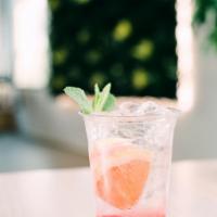 Non-Alcoholic Grape Fruit Mojito · Real fruit muddled with mint and lime juice in sparkling water.