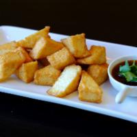 Fried Fish Tofu · Fried fish tofu served with sweet and spicy house sauce.