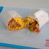Breakfast Burrito · Scrambled eggs, homemade hashbrown, longhorn cheese, and salsa roja. Comes with choice of Sa...