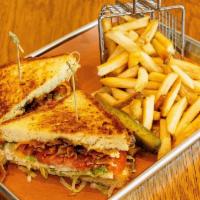 The Grilled LHVB Sandwich · Lettuce, heirloom tomatoes, Vermont cheddar, bacon, Texas toast.