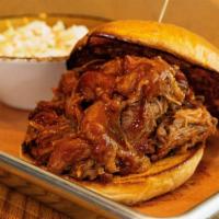 Pulled Pork Sandwich · Pulled pork, cole slaw, Smartmouth Safety Dance BBQ sauce, toasted brioche.