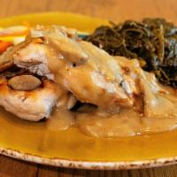 Beer-Braised Chicken · Beer-braised chicken breasts, pan gravy, sautéed mushrooms and onions. Choice of two sides.