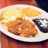 Chilaquiles  · Fried corn tortillas sautéed in a mild green tomatillo salsa. Topped with onions, cilantro, ...