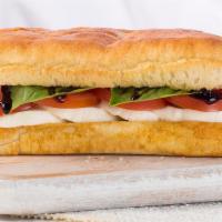 Caprese Sandwich · Fresh mozzarella, Roma tomato, basil, and balsamic.