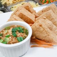 A6. Crispy Tofu  · 8 pieces. Fresh tofu deep-fried until golden brown. served with sweet chili peanut sauce.
