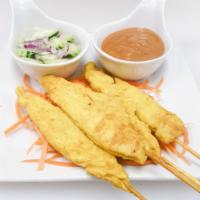 A7. Chicken Satay · 4 sticks. Grilled chicken, marinated in a special thai sauce, skewered on bamboo sticks. Ser...