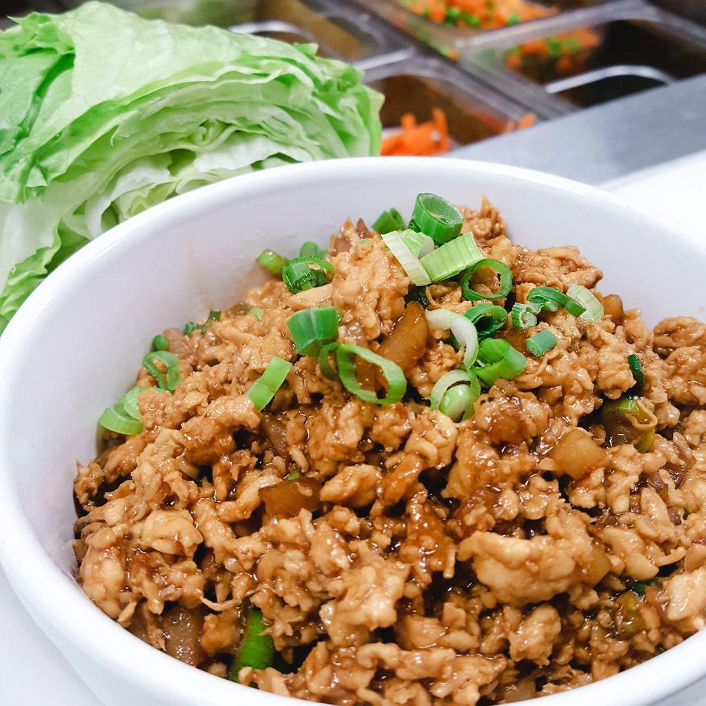 A8. Lettuce Wraps · Minced chicken, water chestnuts, and green onions stir-fired in a light brown sauce. Served with fresh lettuce.