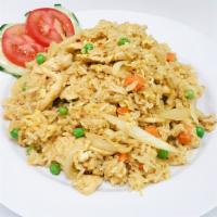 F4. Curry Fried Rice  · Kow pad pong garee. Stir-fried steamed white rice, eggs, onions, peas, carrots, and yellow c...