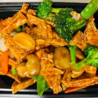 V2. Bean Curd with Vegetables · In brown sauce.