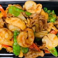 CS1. Asian Chef Delight · French jumbo shrimp, scallop, beef and chicken mixed together with garden greens, stir-fried...