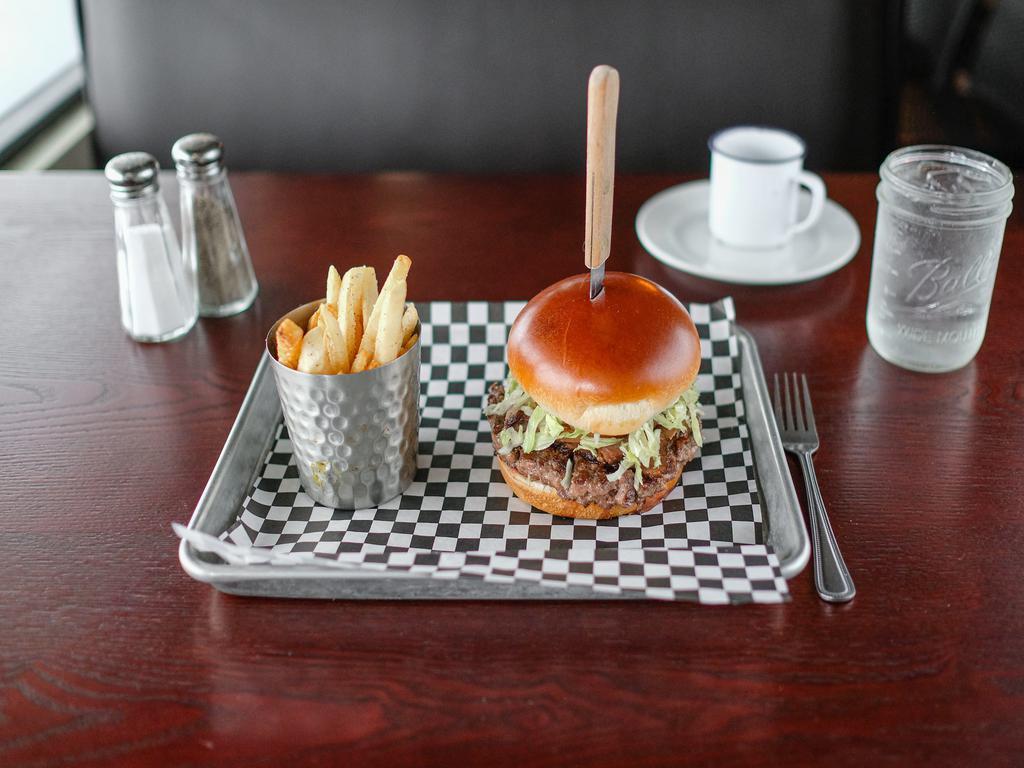 F9F Burger · Topped with smoked brisket, tomato, shredded iceberg, housemade aioli, brioche bun.