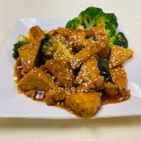 V5. Sesame Tofu · Fried in sweet, tangy sauce topped with sesame seeds.