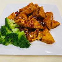 V6. General Tso's Tofu · Classic, fried in sweet & spicy sauce and dried chili peppers. Spicy.