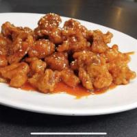 C9. Sesame Chicken · Fried, sweet, tangy sauce with sesame seeds.