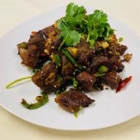 K5. Spare Ribs with Garlic · Scallions, cilantro, bell peppers, dried chili pepper, sesame seeds and spicy chili crisp. S...